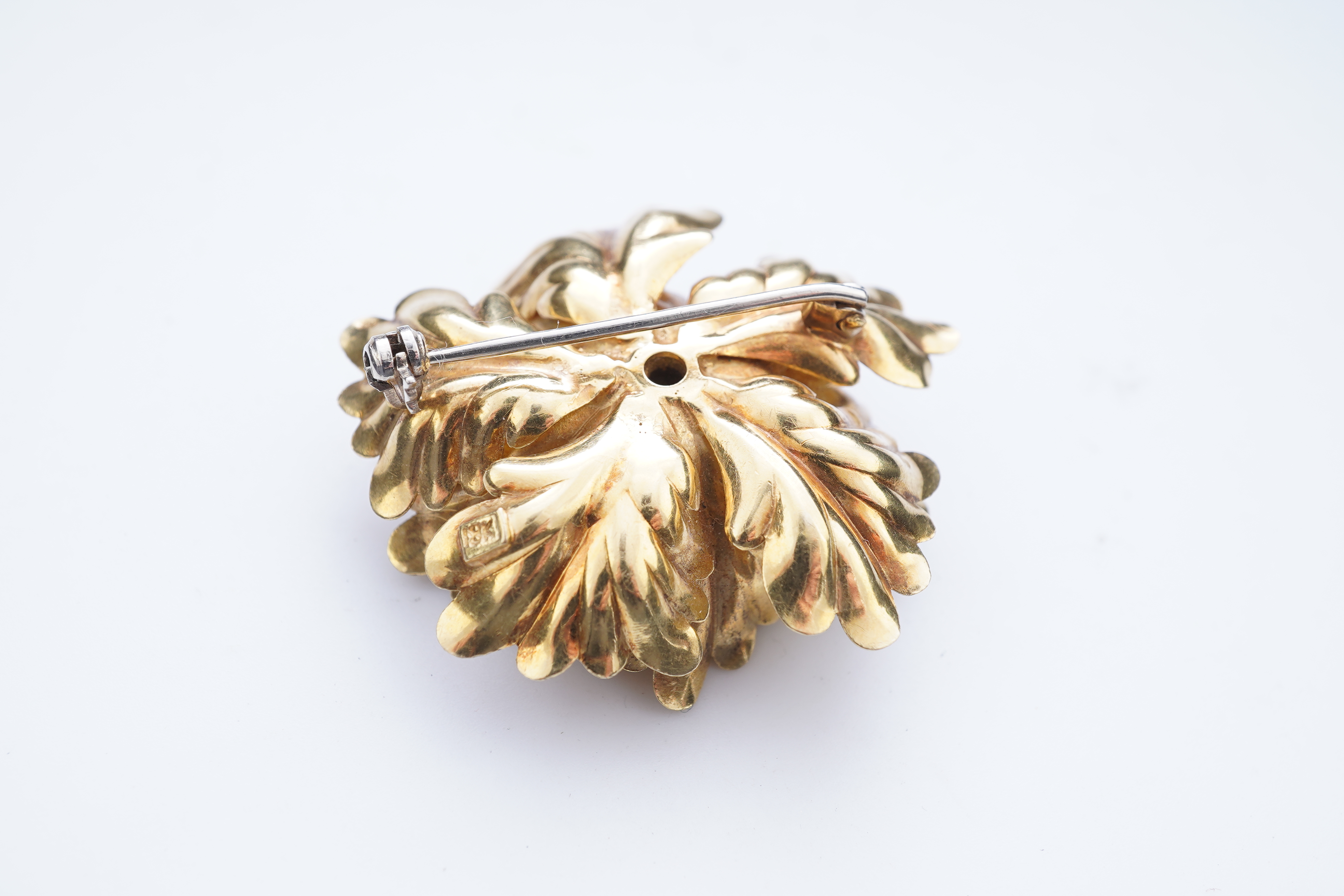 A gold and sapphire brooch, third quarter 20th century